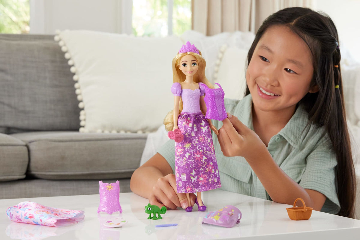 Disney Princess 2-in-1 Stories Rapunzel Fashion Doll With 2 Snap-On Bodices, 2 Skirts & 9 Accessories